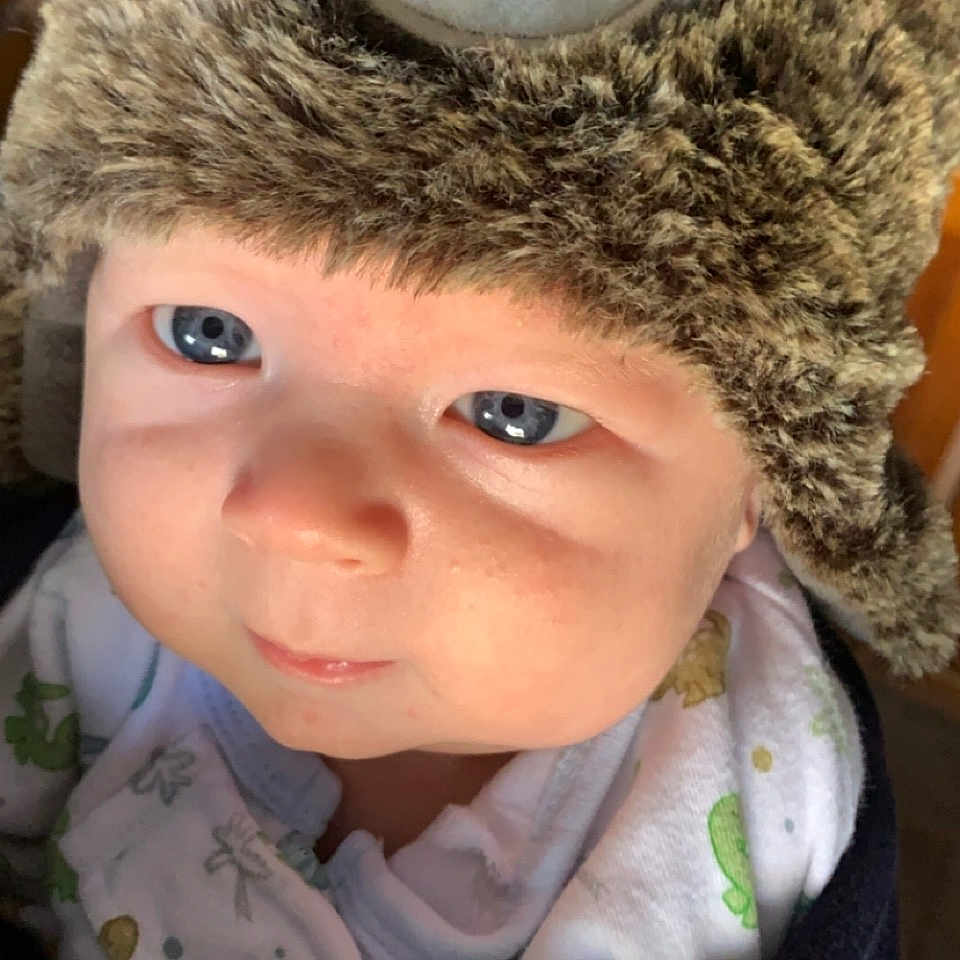 Robert joined the competition — help win amazing prizes! art, cap, eye, eyebrow, eyelash, face, facial_expression, fur_clothing, head, headgear, human_body, iris, jacket, knit_cap, nose, outerwear, skin, textile, toddler, toy