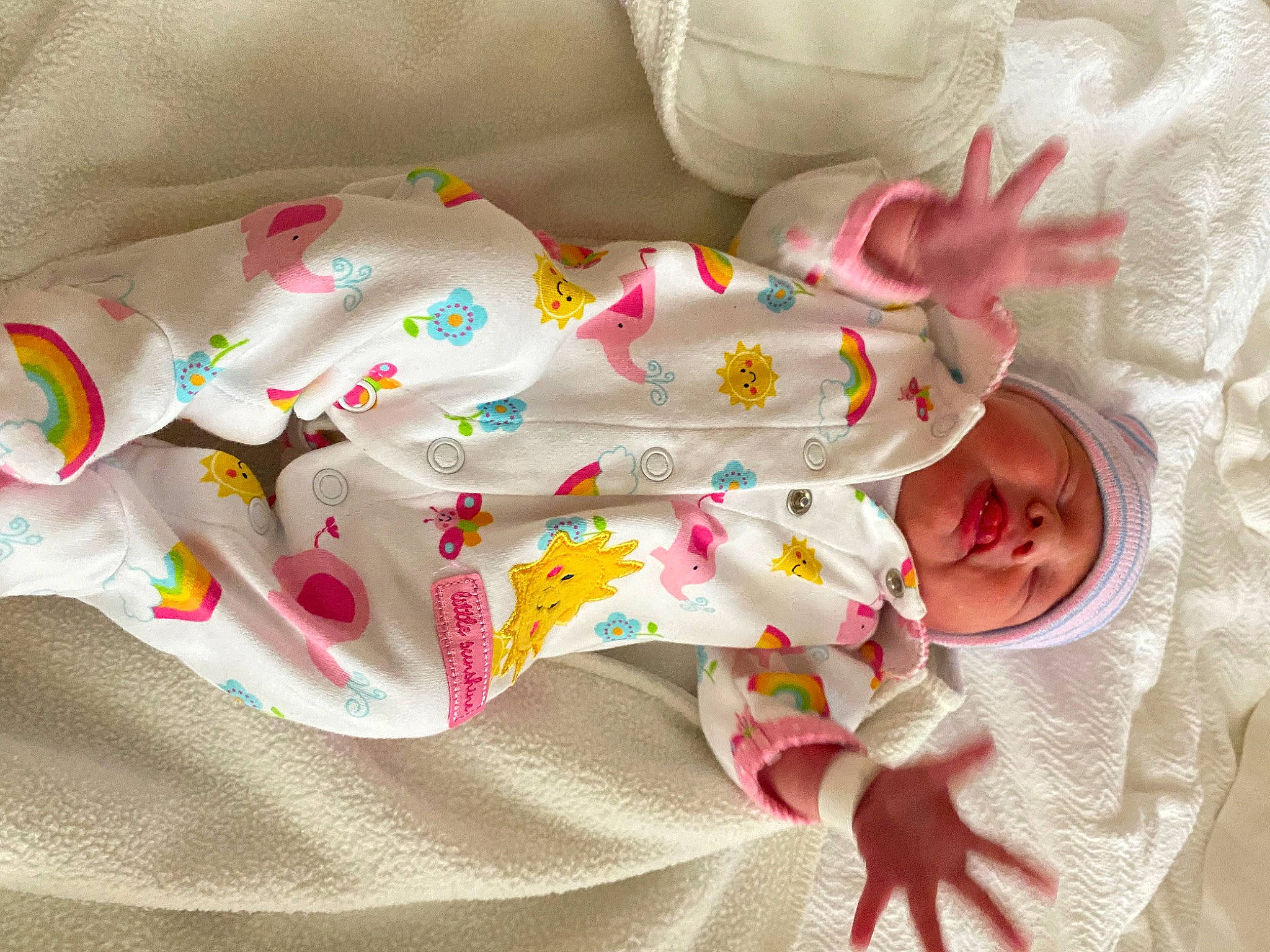 Kenzie is registered to the contest to win money with this photo: baby, baby_products, baby_toddler_clothing, baby_toys, bedding, carmine, child, comfort, font, headwear, infant_bodysuit, linens, nightwear, pattern, person, pink, product, room, sleeve, t_shirt