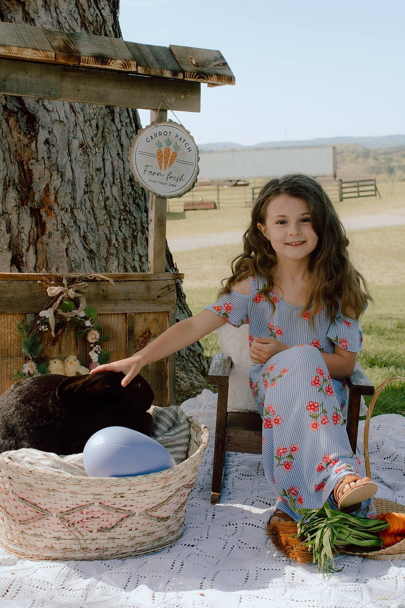 Elaina joined the competition — help win amazing prizes! basket, child, fun, grass, happy, joy, landscape, leisure, pattern, people_in_nature, person, recreation, sitting, sky, soil, t_shirt, tourism, travel, vacation, wood