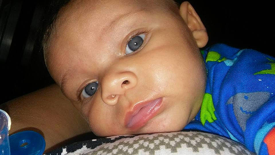 Za'Vion is registered to the contest to win money with this photo: black_hair, boy, cheek, child, chin, close_up, ear, eye, eyebrow, face, finger, forehead, head, infant, lip, mouth, nose, person, skin, smile