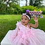 baby, bench, celebration, child, cute, fashion, grass, greenery, happy, headband, nature, outdoor, person, picnic_table, pink_dress, playful, portrait, smiling, summer, toddler