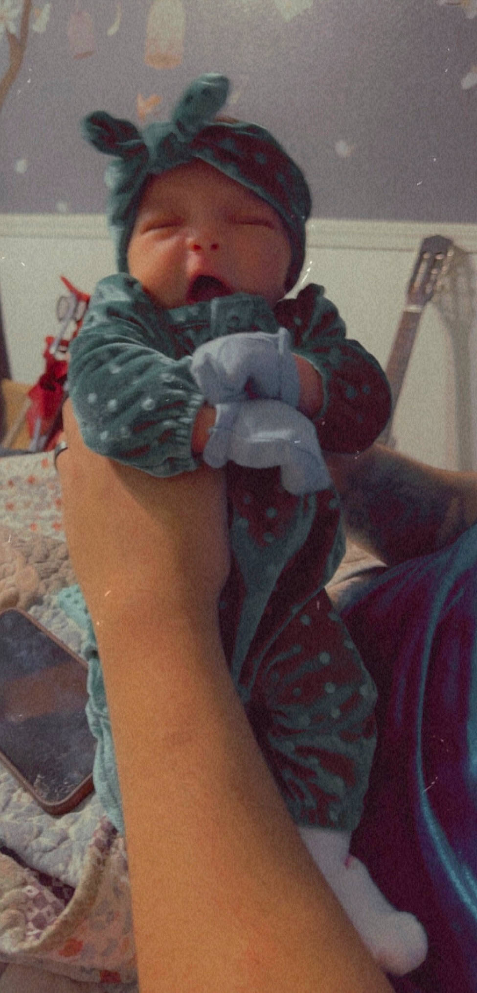 Winter is registered to the contest to win money with this photo: abdomen, arm, baby, cheek, chest, child, comfort, elbow, finger, hand, headwear, human_body, human_leg, knee, nail, person, personal_protective_equipment, skin, thigh, thumb