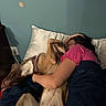 dog, person, bed, pillow, hugging, snuggling, indoor, blanket, wall, canine, pet, relaxing, casual, comfort, sleepwear, domestic, friendship, resting, cuddle, affection