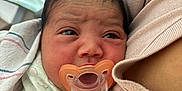 Journey is registered to the contest to win money with this photo: newborn, baby, pacifier, blanket, infant, close_up, person, skin, hand, clothing, resting, comfort, indoors, human, face, cute, tiny, soft, portrait, newborn_baby