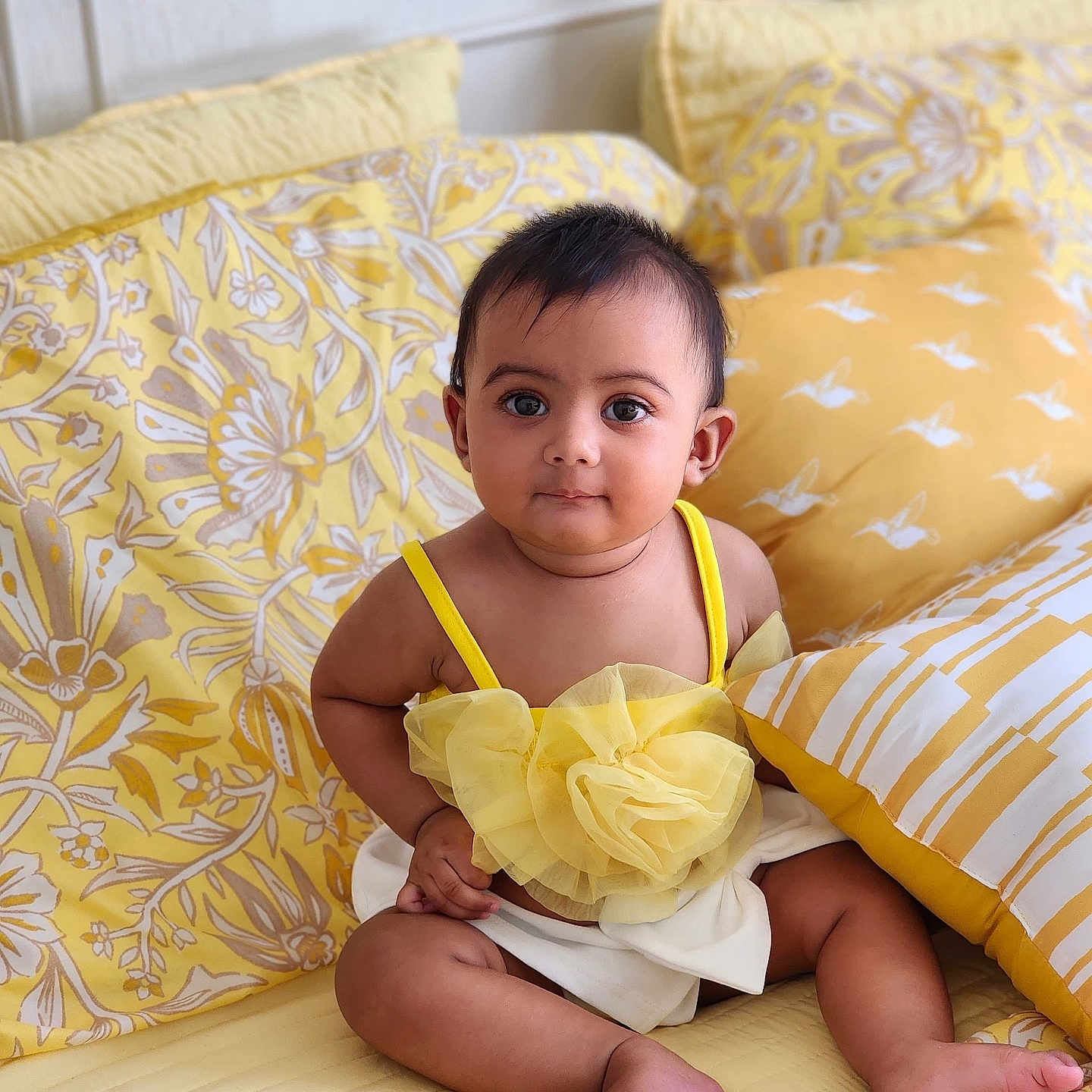 Avira joined the competition — help win amazing prizes! baby, bed, child, clothing, comfortable, cute, decor, eyes, fabric, face, indoors, infant, pattern, person, pillow, portrait, sitting, skin, soft, yellow