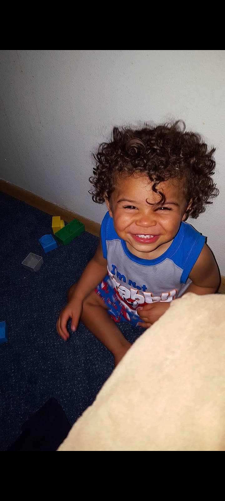 Chance joined the competition — help win amazing prizes! baby_toddler_clothing, cheek, electric_blue, floor, flooring, fun, hair, happy, head, human_body, iris, joy, leisure, mouth, nose, person, room, sitting, skin, smile