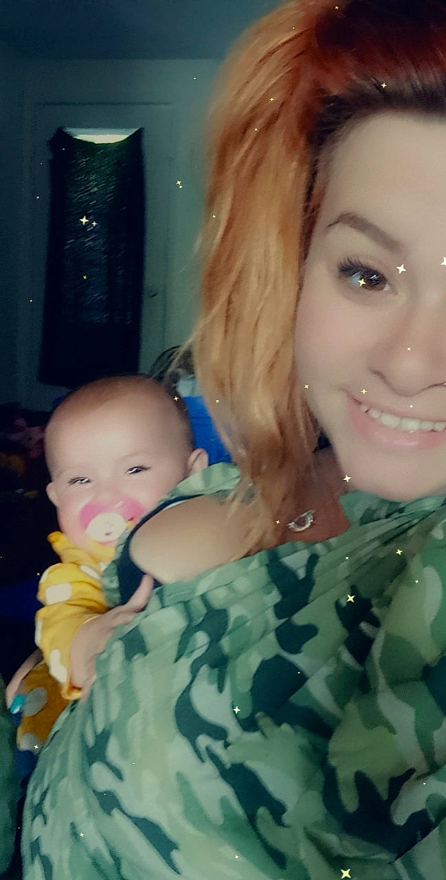 Summer is registered to the contest to win money with this photo: black_hair, cheek, chin, eye, eyelash, face, facial_expression, hairstyle, human_body, iris, layered_hair, lip, military_camouflage, mouth, muscle, nose, person, skin, smile, toy