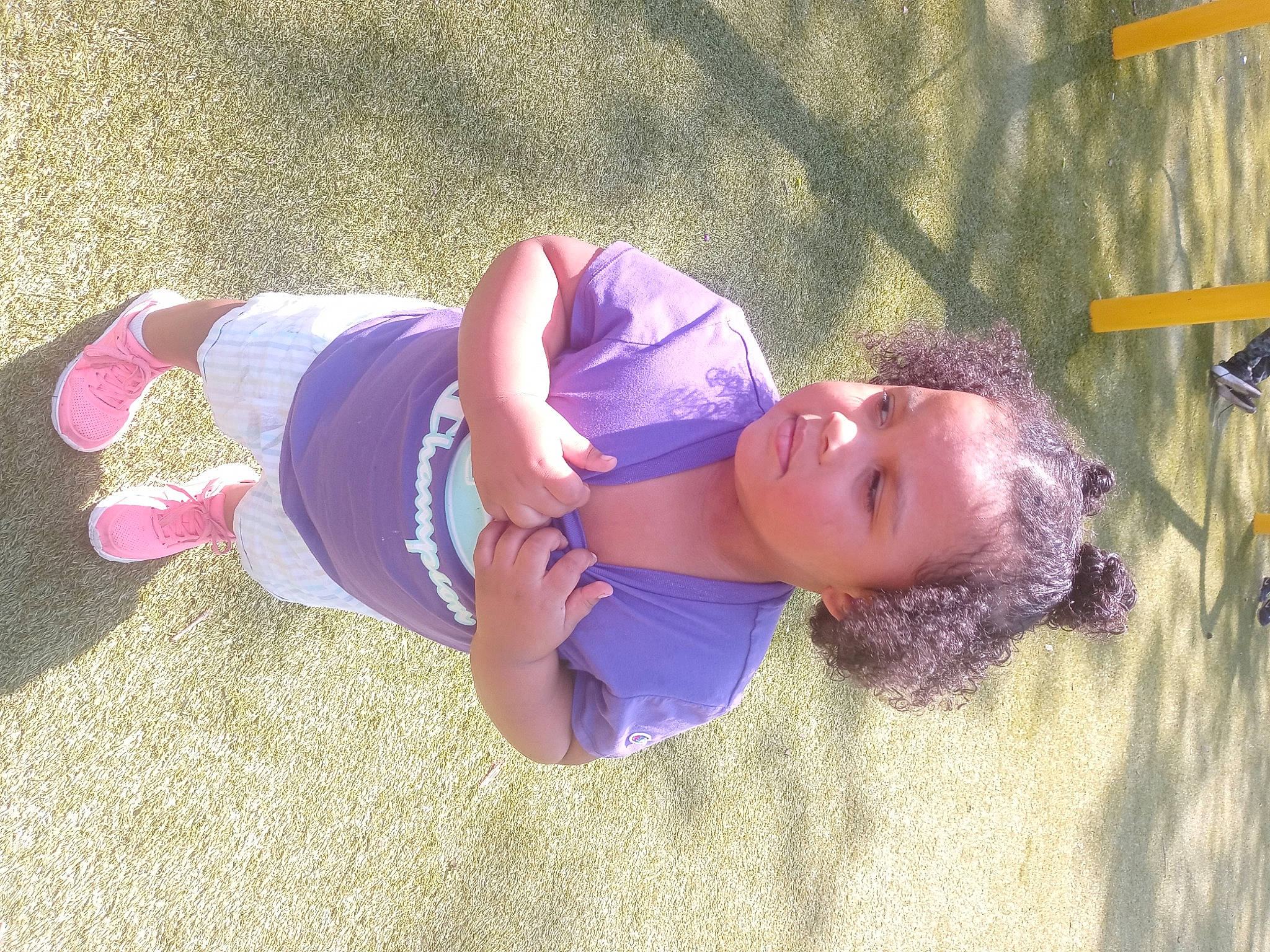 Aaliyah is registered to the contest to win money with this photo: beauty, electric_blue, face, fun, grass, happy, hat, human_leg, knee, leisure, magenta, people_in_nature, person, pink, plant, play, purple, recreation, smile, thigh