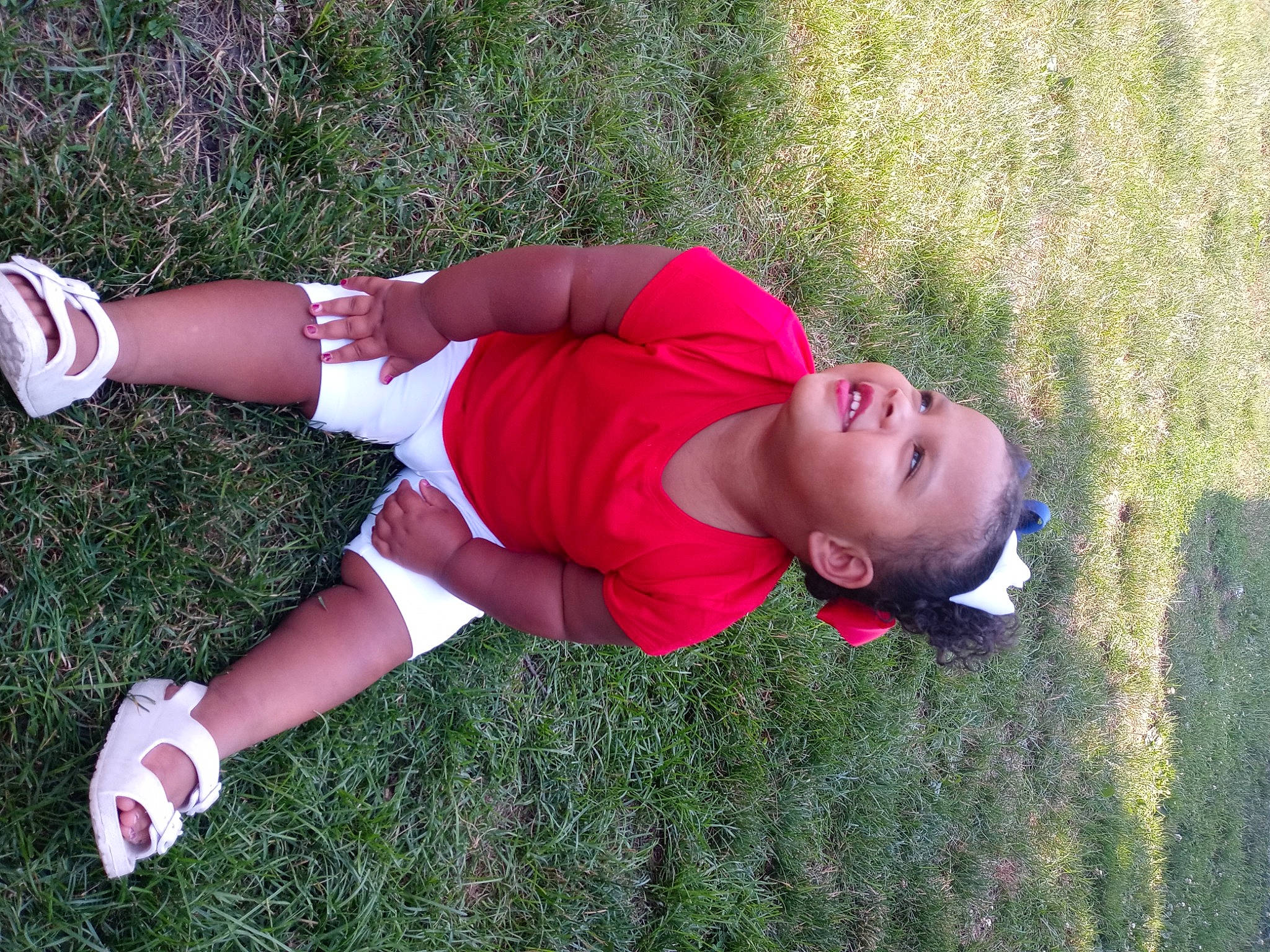 Aaliyah joined the competition — help win amazing prizes! abdomen, chest, elbow, fun, grass, grass_family, happy, human_leg, joint, knee, lawn, people_in_nature, person, plant, shorts, sock, sports_uniform, sportswear, t_shirt, thigh