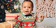 Swann participe au concours pour gagner de l'argent avec cette photo : toddler, child, smiling, christmas_sweater, holiday, presents, decorations, lights, festive, indoors, happy, cute, face, portrait, winter, cozy, celebration, bow_tie, background, warm