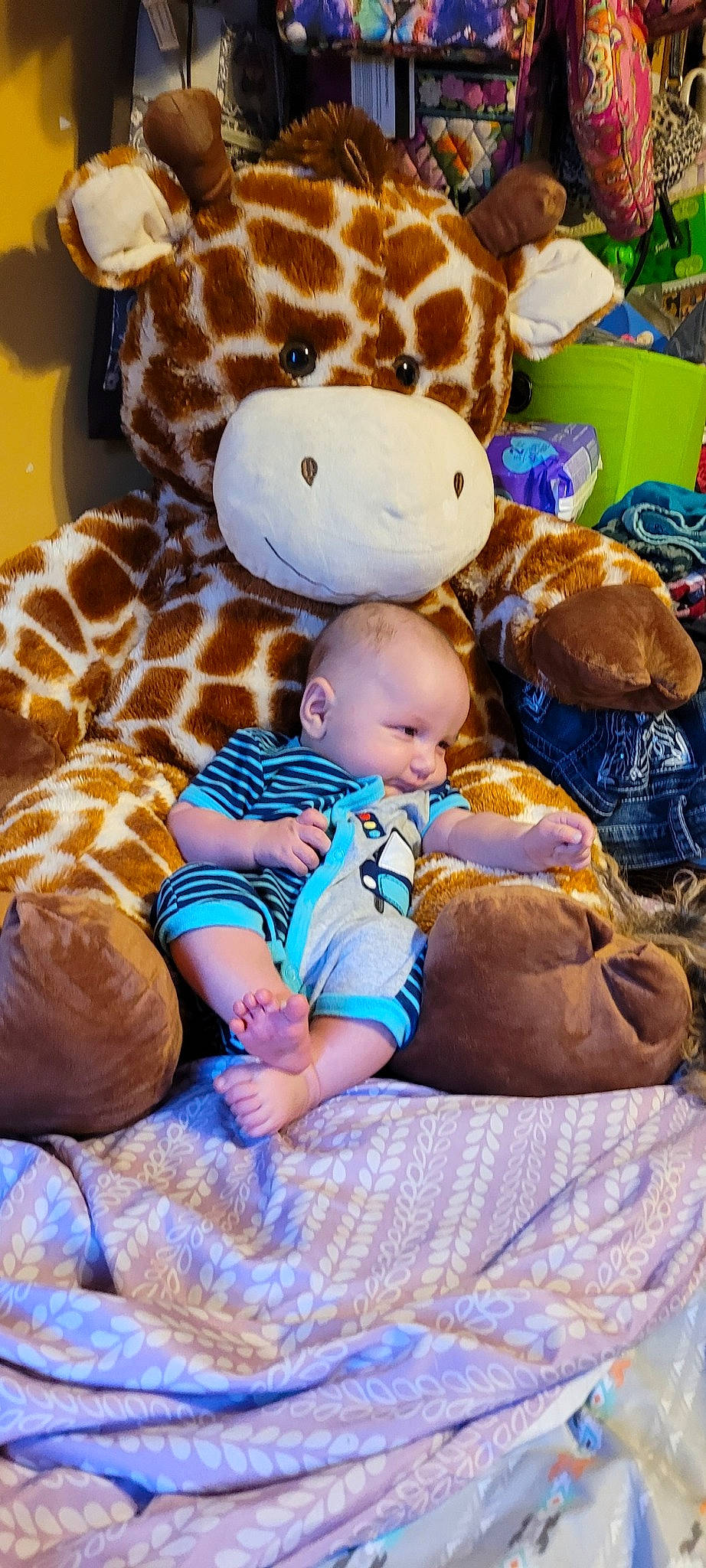 Ragnar joined the competition — help win amazing prizes! baby, baby_toddler_clothing, child, comfort, fun, fur, giraffe, giraffidae, happy, linens, mammal, person, plush, room, sitting, stuffed_toy, teddy_bear, terrestrial_animal, toddler, toy