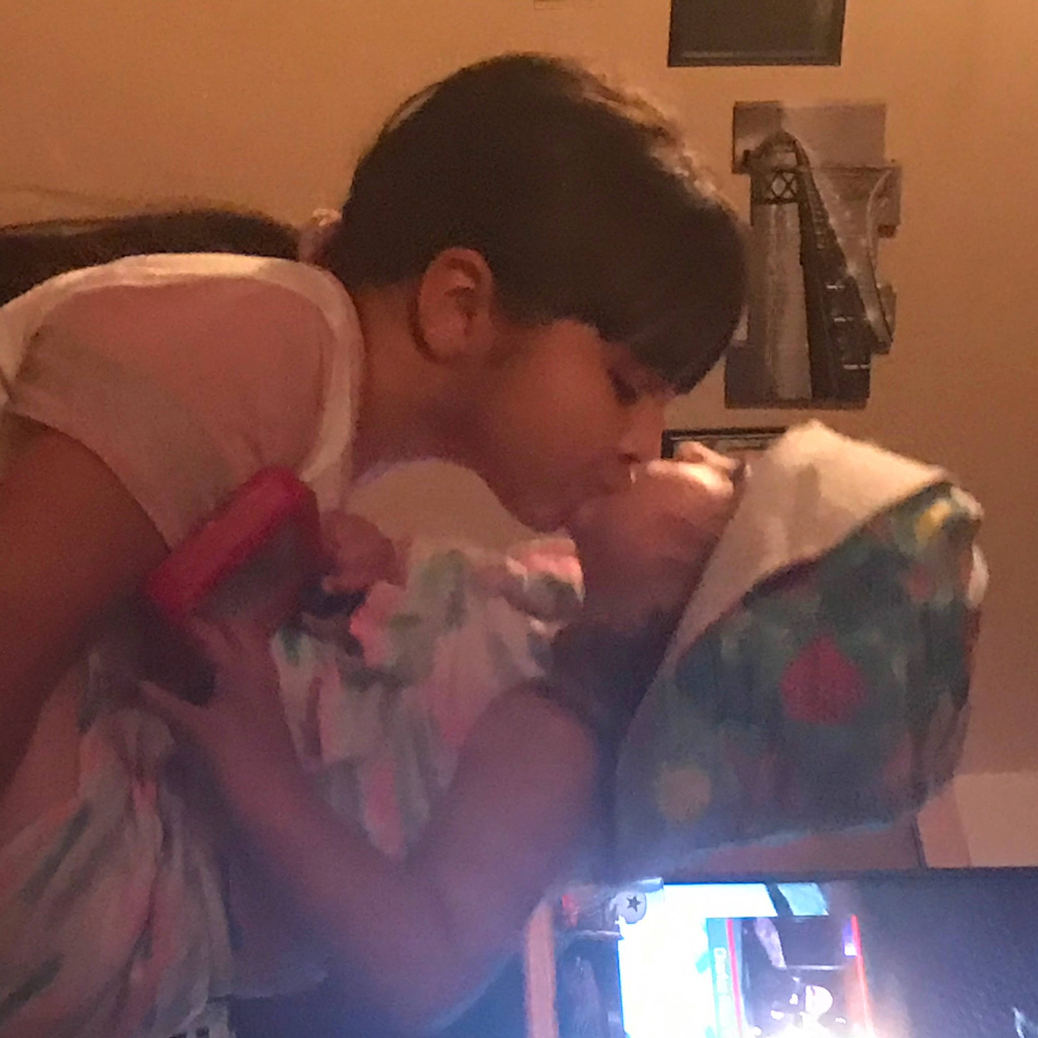 Estrella is registered to the contest to win money with this photo: birth, black_hair, ear, forehead, gesture, hug, human, interaction, kiss, love, person, photography, romance