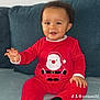 Gabriel-Marcio participe au concours pour gagner de l'argent avec cette photo : baby, babylaughing, bodypart, clothing, couch, cushion, face, finger, furniture, hand, happy, head, homedecor, pajamas, pants, person, photography, portrait, sitting, smile