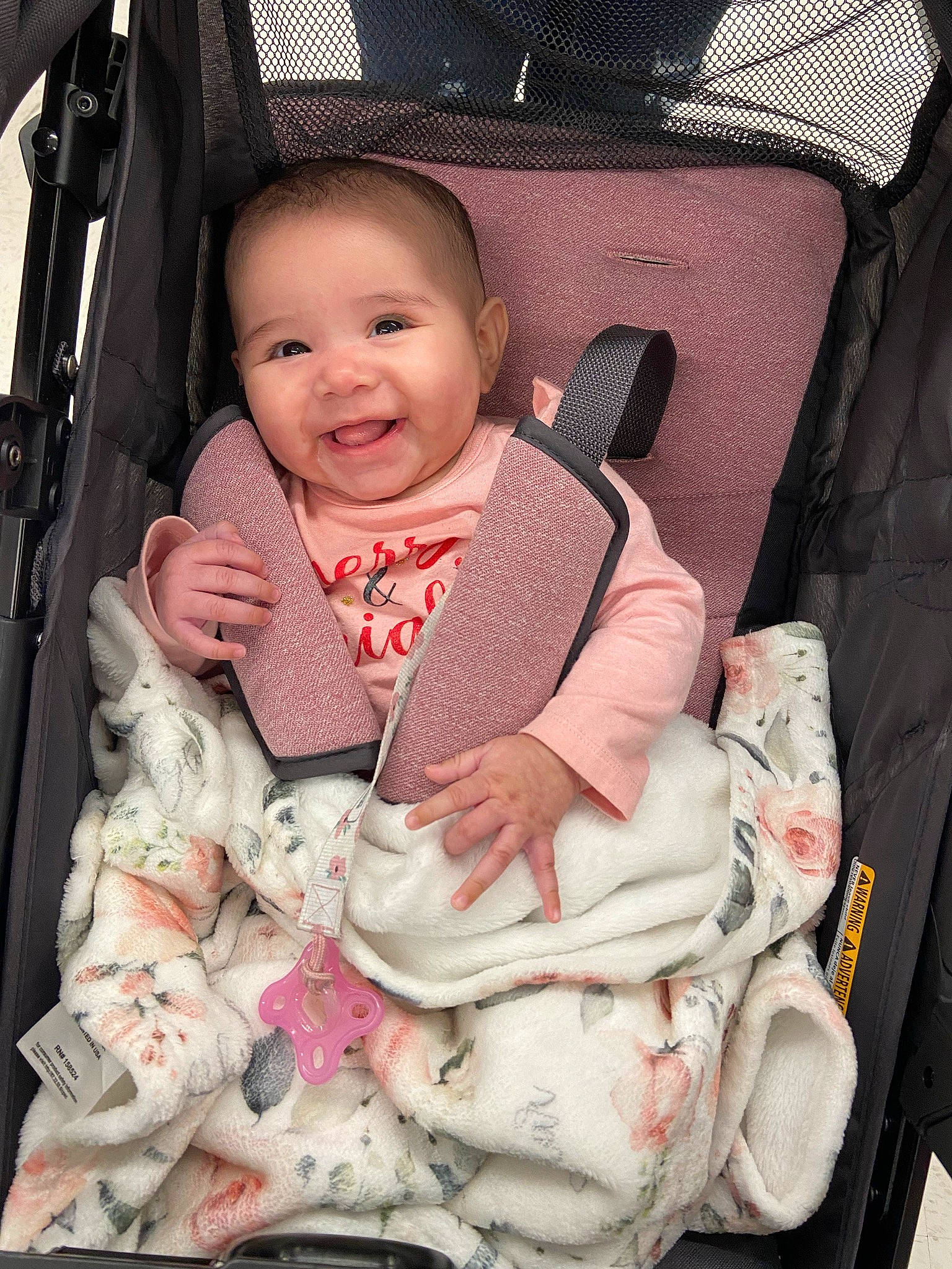 Skylar joined the competition — help win amazing prizes! auto_part, baby, baby_carriage, baby_products, baby_safety, baby_toddler_clothing, bag, car_seat, chair, cheek, child, comfort, happy, joy, person, pink, product, seat_belt, sitting, sleeve