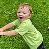 Brodhi is registered to the contest to win money with this photo: child, toddler, grass, green_shirt, happy, smiling, outdoor, playing, person, shorts, curly_hair, daylight, nature, fun, cute, active, boy, feet, lawn, casual_clothing