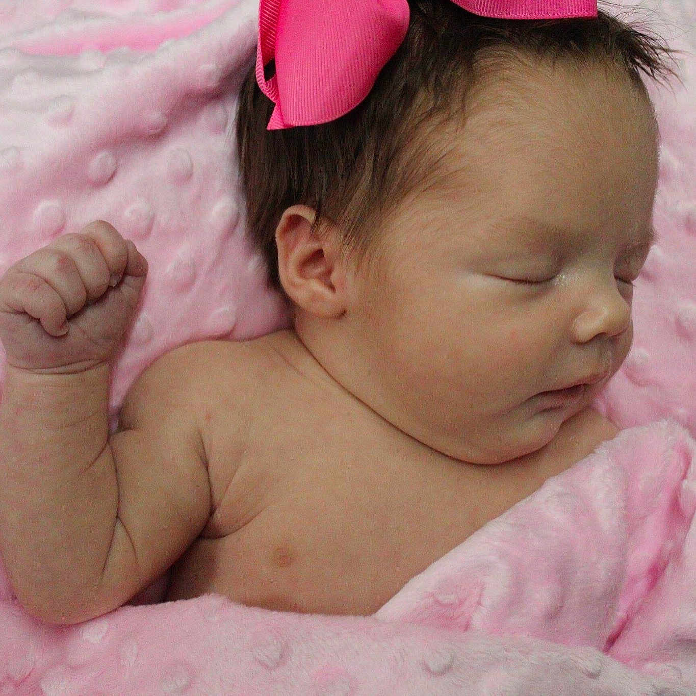 Emmaleigh is registered to the contest to win money with this photo: baby, cheek, child, ear, eye, face, finger, forehead, hair_accessory, hand, head, headband, headgear, lip, mouth, neck, nose, person, pink, skin