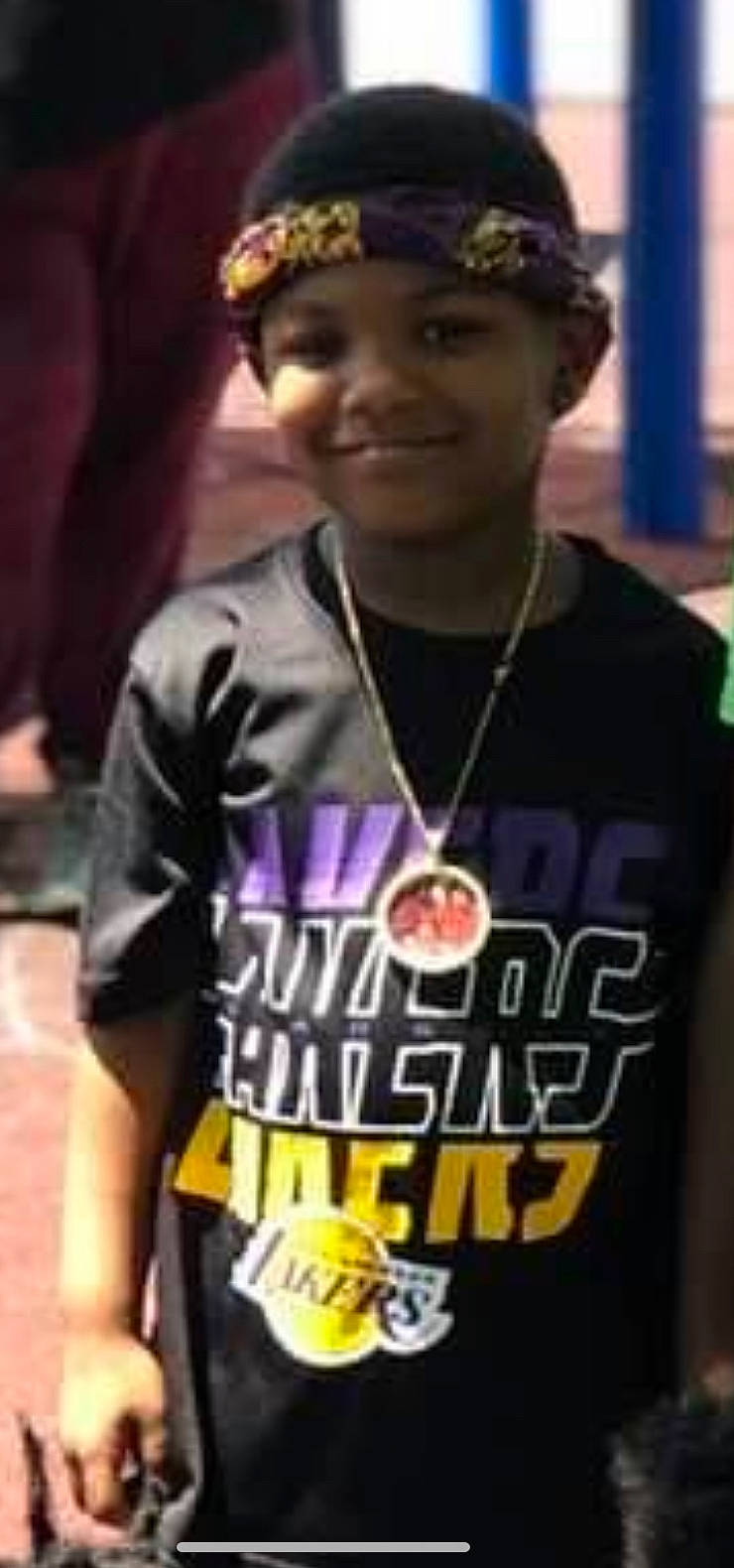 Idris is registered to the contest to win money with this photo: black, cap, chest, competition_event, cool, electric_blue, event, fashion_design, font, hat, headpiece, headwear, jersey, jewellery, joy, necklace, person, sleeve, smile, sportswear