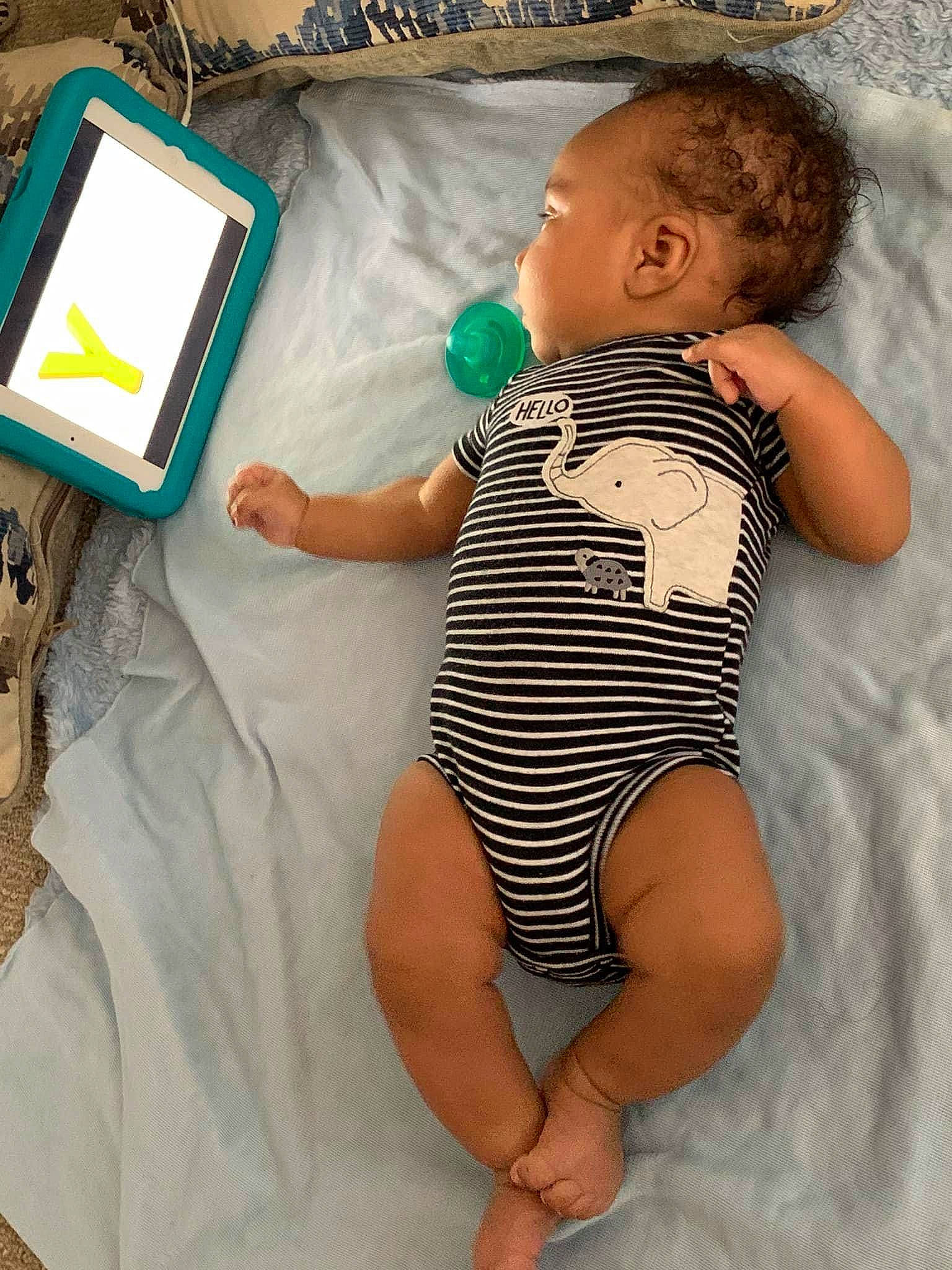 Mikah joined the competition — help win amazing prizes! baby, baby_sleeping, baby_toddler_clothing, comfort, finger, green, hand, human_body, infant_bodysuit, joint, leg, person, personal_computer, photograph, skin, standing, stomach, textile, thigh, toddler