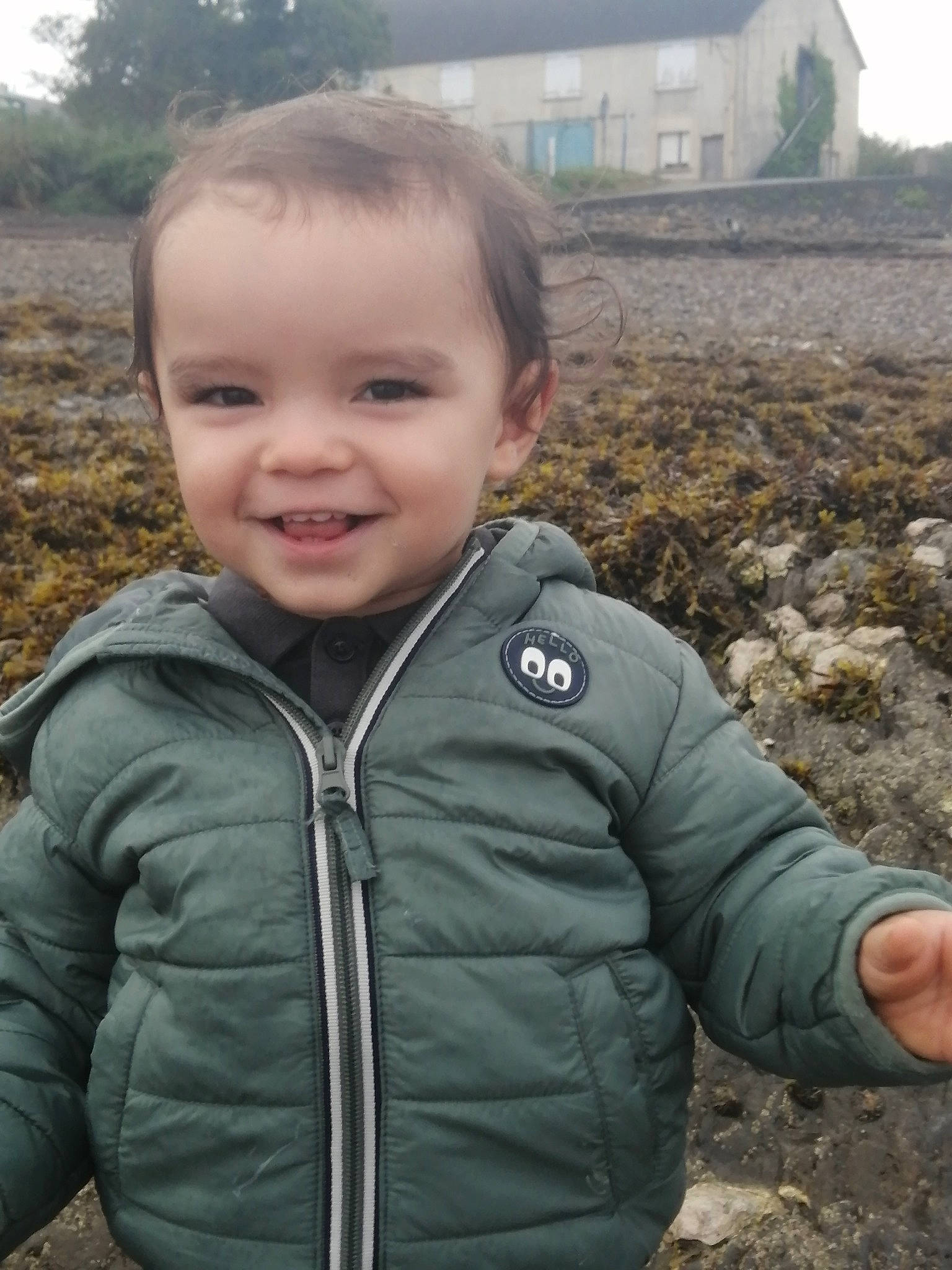 Timéo participe au concours pour gagner de l'argent avec cette photo : building, child, grass, happy, hood, hoodie, jacket, joy, landscape, outerwear, person, plant, skin, sky, sleeve, smile, soil, toddler, travel, tree
