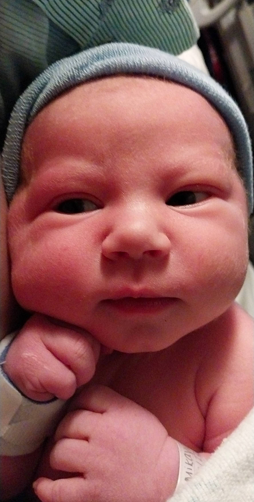 Damien is registered to the contest to win money with this photo: baby, cheek, child, chin, eyebrow, eyelash, face, facial_expression, finger, forehead, gesture, human, lip, mouth, nose, person, pink, skin, smile, thumb