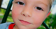 Kayden joined the competition — help win amazing prizes! child, boy, face, smile, blonde_hair, brown_eyes, outdoor, playground, greenery, shirt, collar, portrait, close_up, happy, young, person, casual_clothing, daylight, skin, head