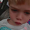 Kayden joined the competition — help win amazing prizes! child, blonde_hair, car_seat, white_shirt, text_overlay, sparkles, close_up, pouty_face, young_child, casual_clothing, portrait, indoors, car_interior, expression, cute, soft_filter, heart, sitting, looking_down, selfie