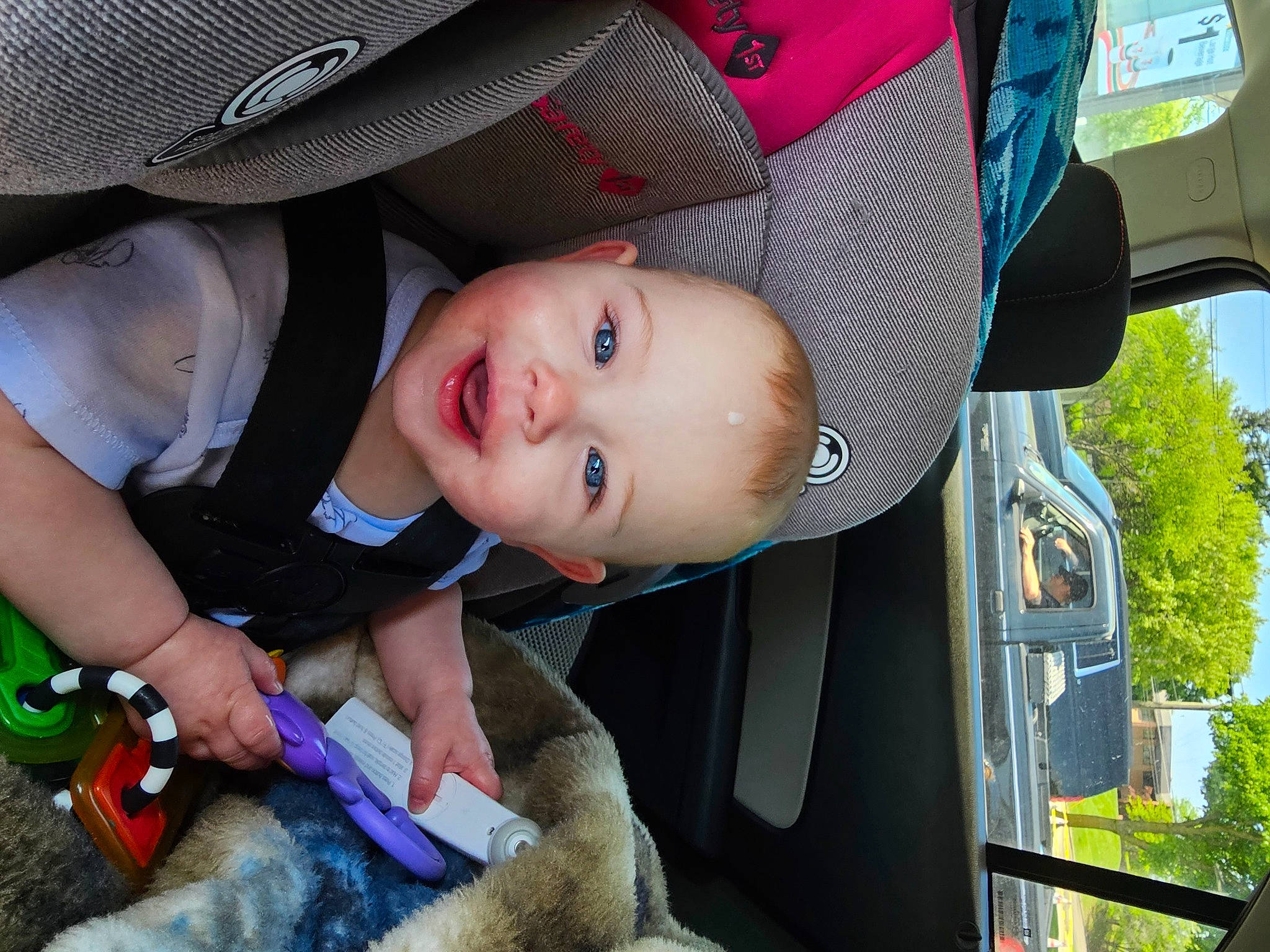 Susan joined the competition — help win amazing prizes! auto_part, automotive_exterior, automotive_lighting, automotive_tire, automotive_wheel_system, baby_products, child, fun, grass, green, hat, mammal, motor_vehicle, person, plant, smile, snapshot, toddler, tree, vehicle_door