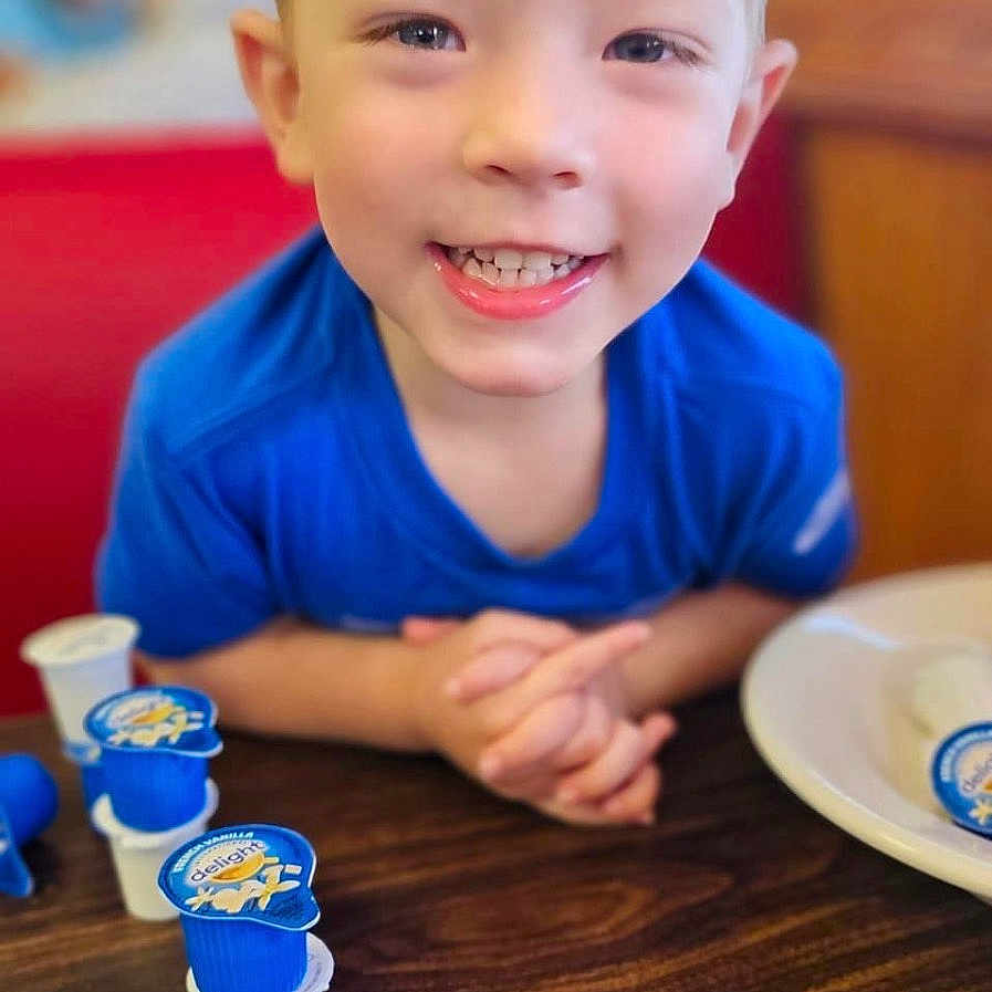 Nathaniel joined the competition — help win amazing prizes! boy, child, cream, cutlery, dessert, diningtable, face, food, furniture, happy, head, icecream, icing, male, person, photography, portrait, smile, spoon, table