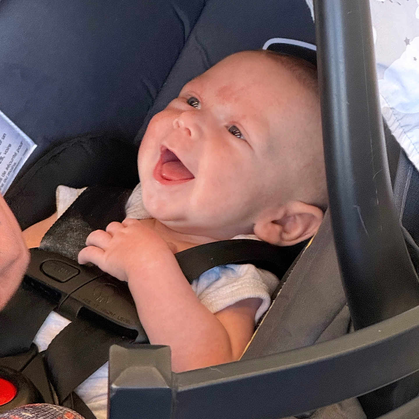 Colten joined the competition — help win amazing prizes! baby, infant, car_seat, smile, happy, child, safety_harness, seatbelt, person, portrait, cute, cheerful, indoor, clothing, head, face, hand, seat, young, joyful