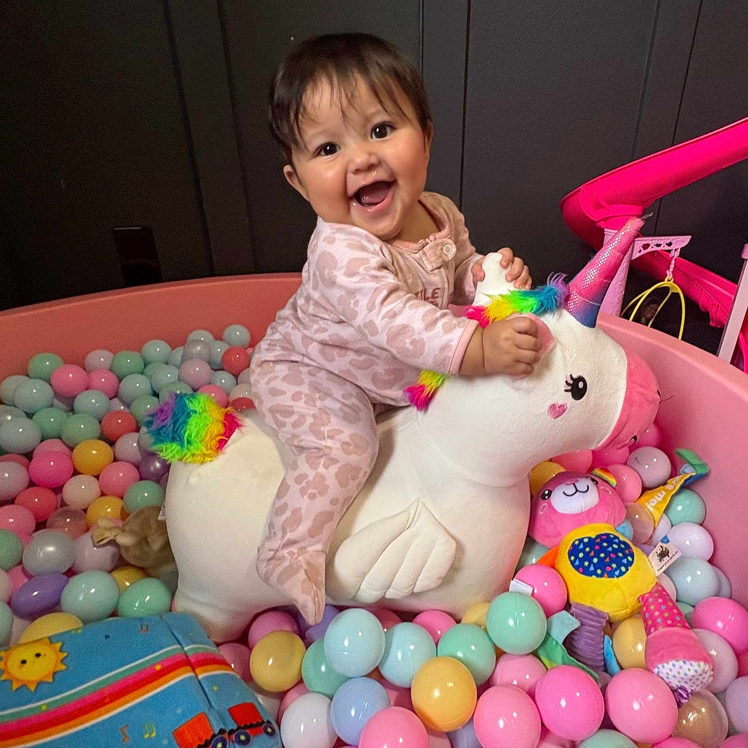 Oaklie J. joined the competition — help win amazing prizes! baby, balloon, clothing, cream, dessert, dress, face, food, furniture, happy, head, icing, indoors, person, photography, playarea, portrait, purple, sitting, toy