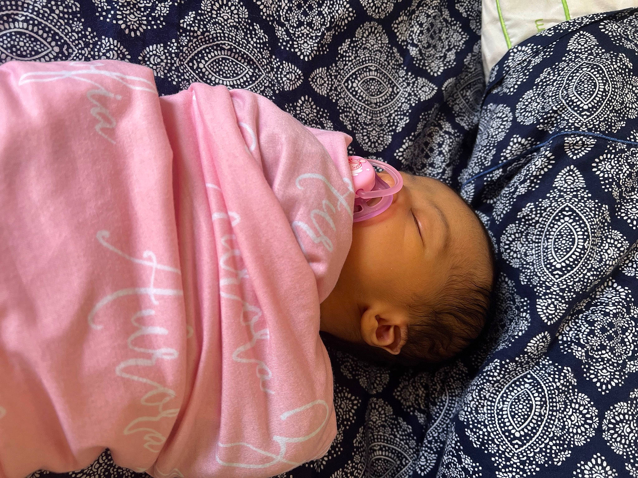 Aurora joined the competition — help win amazing prizes! arm, baby, baby_products, baby_sleeping, baby_toddler_clothing, cheek, child, comfort, couch, hand, human_body, leg, linens, magenta, pattern, person, pink, sitting, skin, sleeve