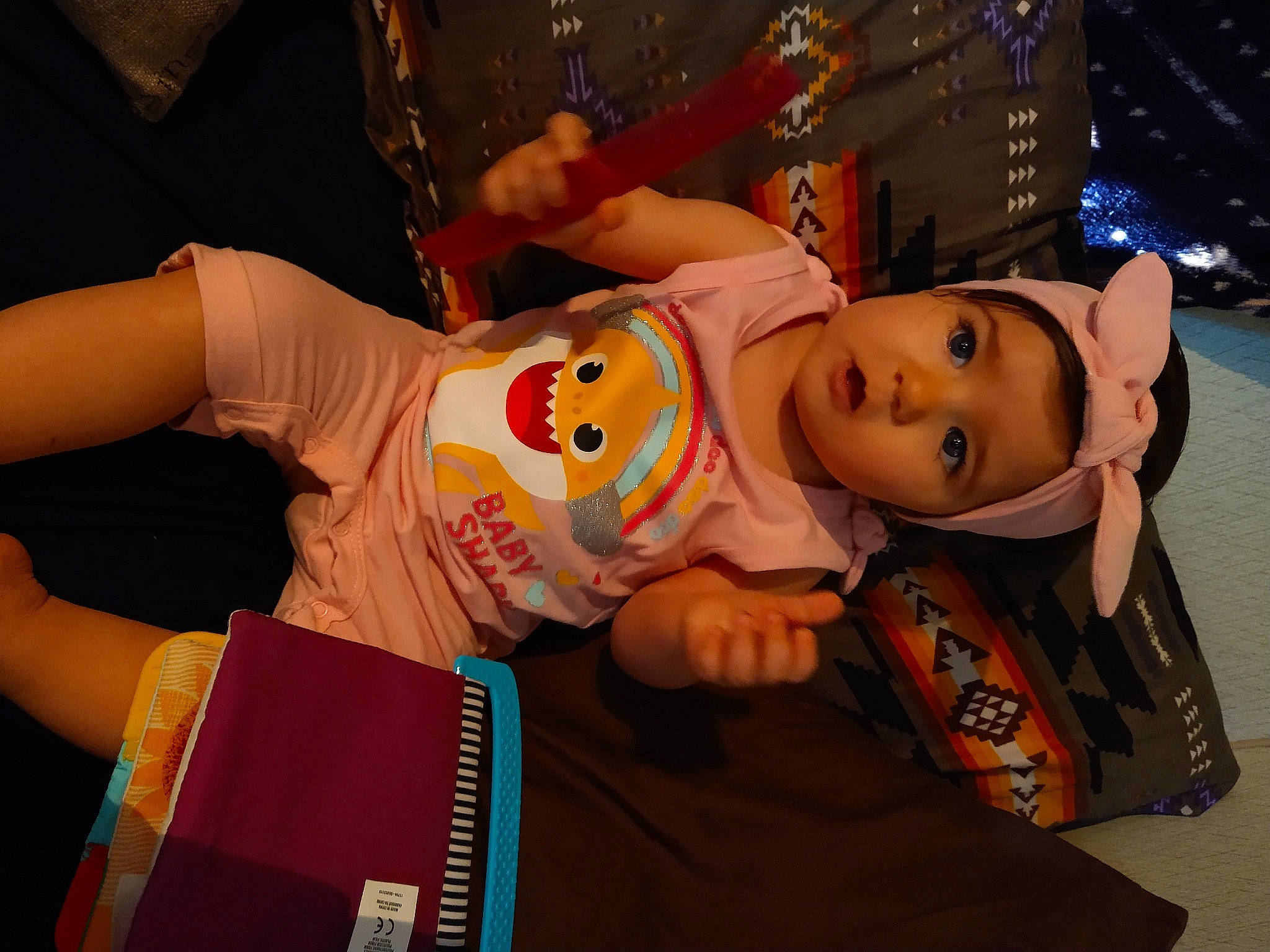 Rylee joined the competition — help win amazing prizes! baby, baby_toddler_clothing, child, event, fun, happy, human, leisure, orange, person, room, sitting, t_shirt, toddler