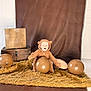 Emory is registered to the contest to win money with this photo: baby, child, costume, bear, brown, balloon, rug, fur, wood, box, happy, smiling, indoor, portrait, cute, plush, sitting, background, photography, cozy