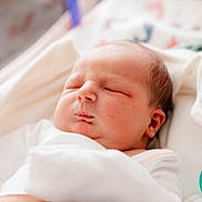 Mason joined the competition — help win amazing prizes! baby, newborn, sleeping, blanket, white_clothing, infant, face, peaceful, soft_light, closeup, portrait, indoors, cozy, skin, head, child, rest, cute, young, bed