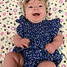 Millie joined the competition — help win amazing prizes! baby, blue_dress, headband, smiling, lying_down, quilt, patterned_blanket, ladybugs, bees, flowers, cute, infant, child, happy, baby_girl, skin, legs, hands, indoor, portrait