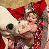 Gracie is registered to the contest to win money with this photo: baby, dog, white_dog, quilt, carpet, playful, happy, smiling, child, pet, indoor, blanket, toddler, fur, barefoot, cute, animal, friendship, cuddling, fun