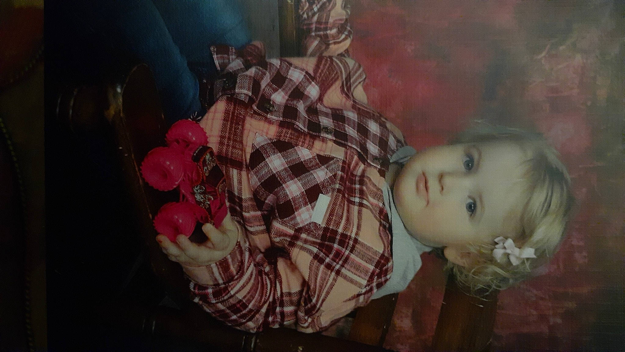 Ocean is registered to the contest to win money with this photo: art, child, darkness, flash_photography, fun, grass, headgear, lip, mouth, pattern, person, pink, plaid, plant, rose, tartan, textile, toddler, toy, vintage_clothing