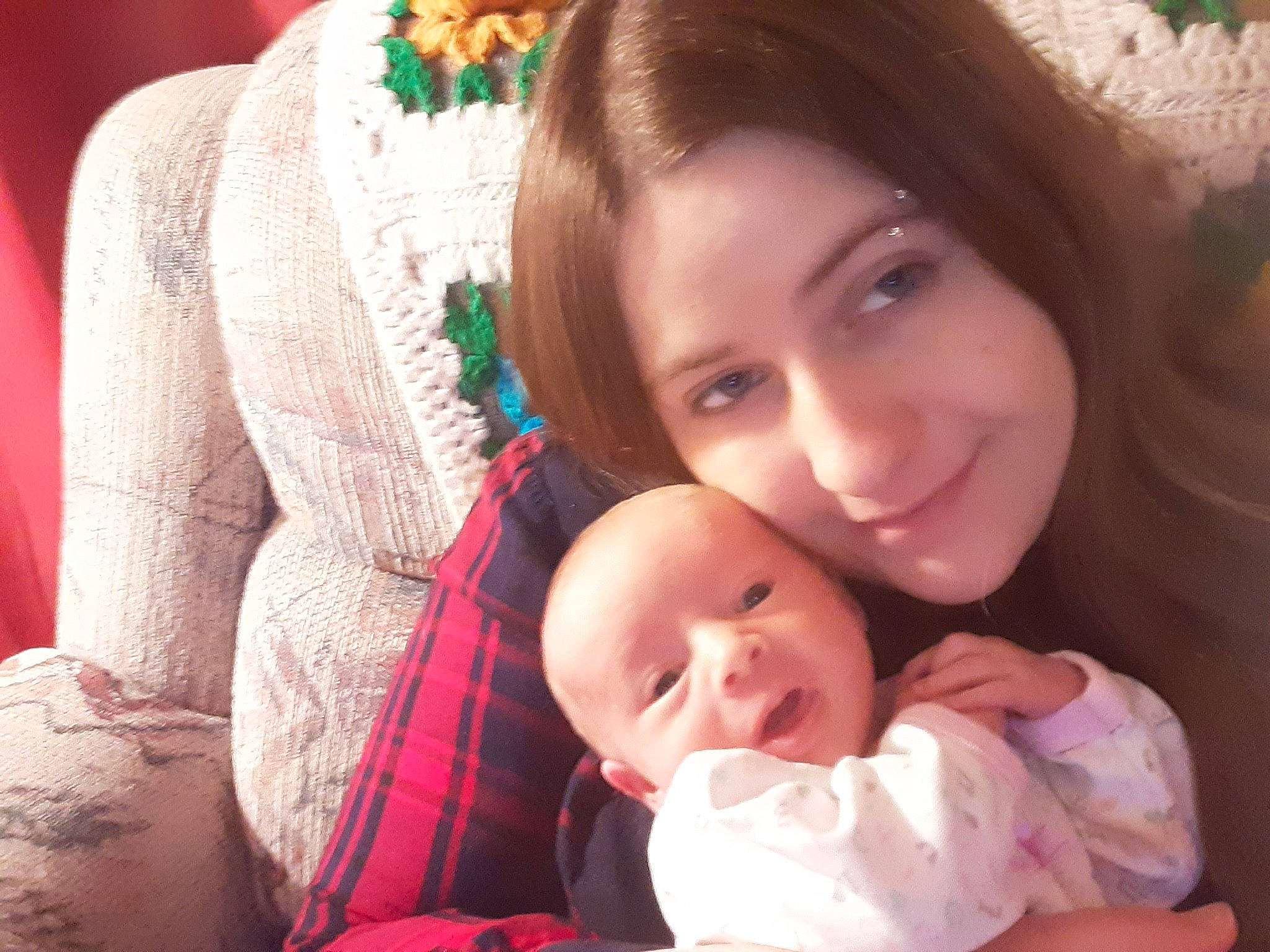 Ocean is registered to the contest to win money with this photo: baby, cheek, child, chin, clothing, comfort, eye, face, facial_expression, hairstyle, happy, headgear, iris, joy, nose, organ, person, skin, smile, tartan