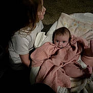 Kali joined the competition — help win amazing prizes! baby, child, blanket, carpet, cushion, face, floor, infant, indoors, light, person, portrait, pink, rest, sitting, sleeping_baby, soft, toddler, white_clothing, young_child