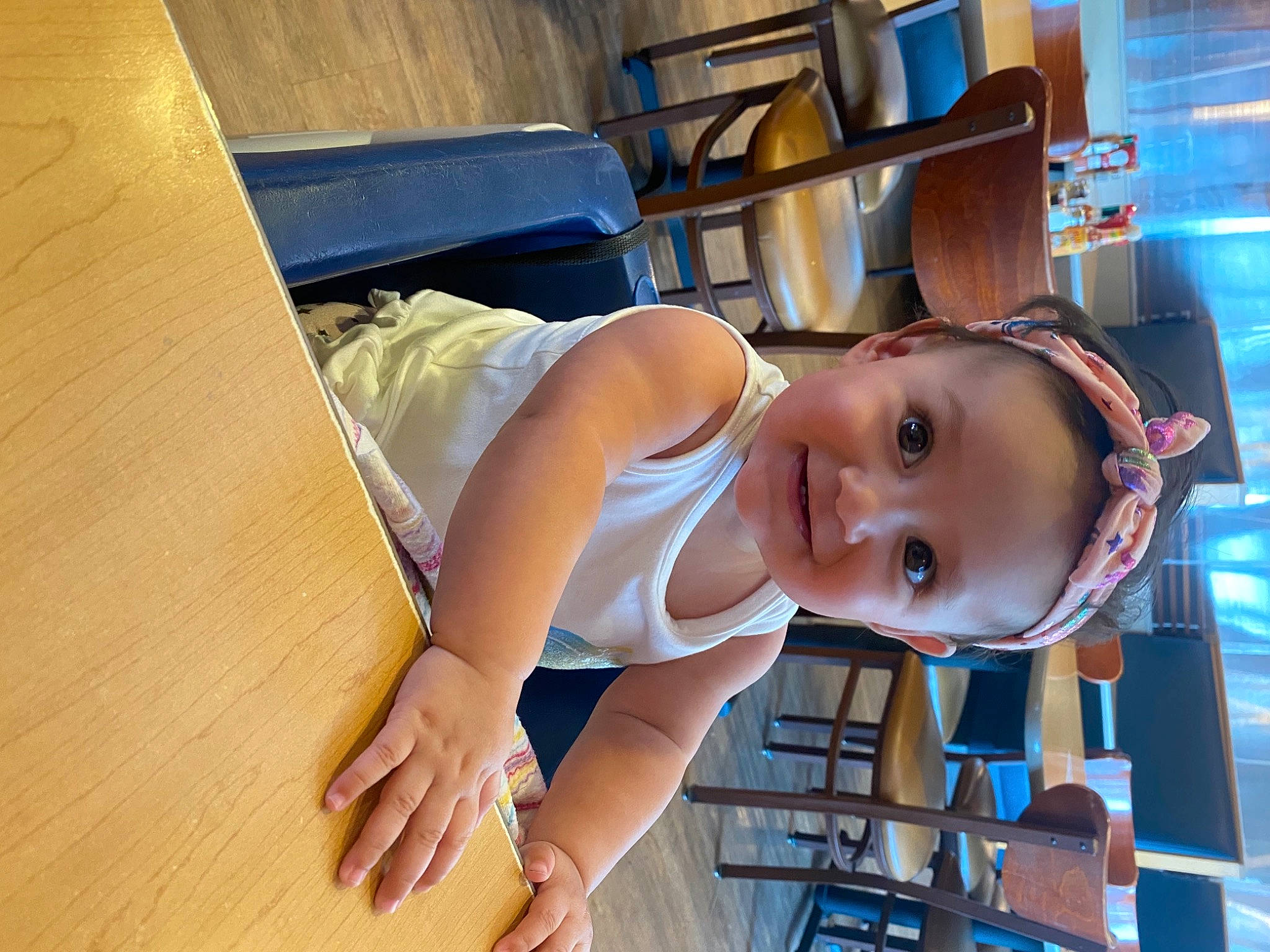 Kamila joined the competition — help win amazing prizes! chair, child, comfort, elbow, eyewear, fun, happy, hardwood, hat, human_leg, joy, knee, leisure, person, room, shorts, sitting, smile, sunglasses, thigh