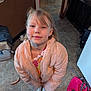 Wil is registered to the contest to win money with this photo: child, girl, smile, jacket, pink, shoes, silver, backpack, floor, tile, indoor, home, dimples, hairclip, clothing, person, portrait, standing, looking_up, casual