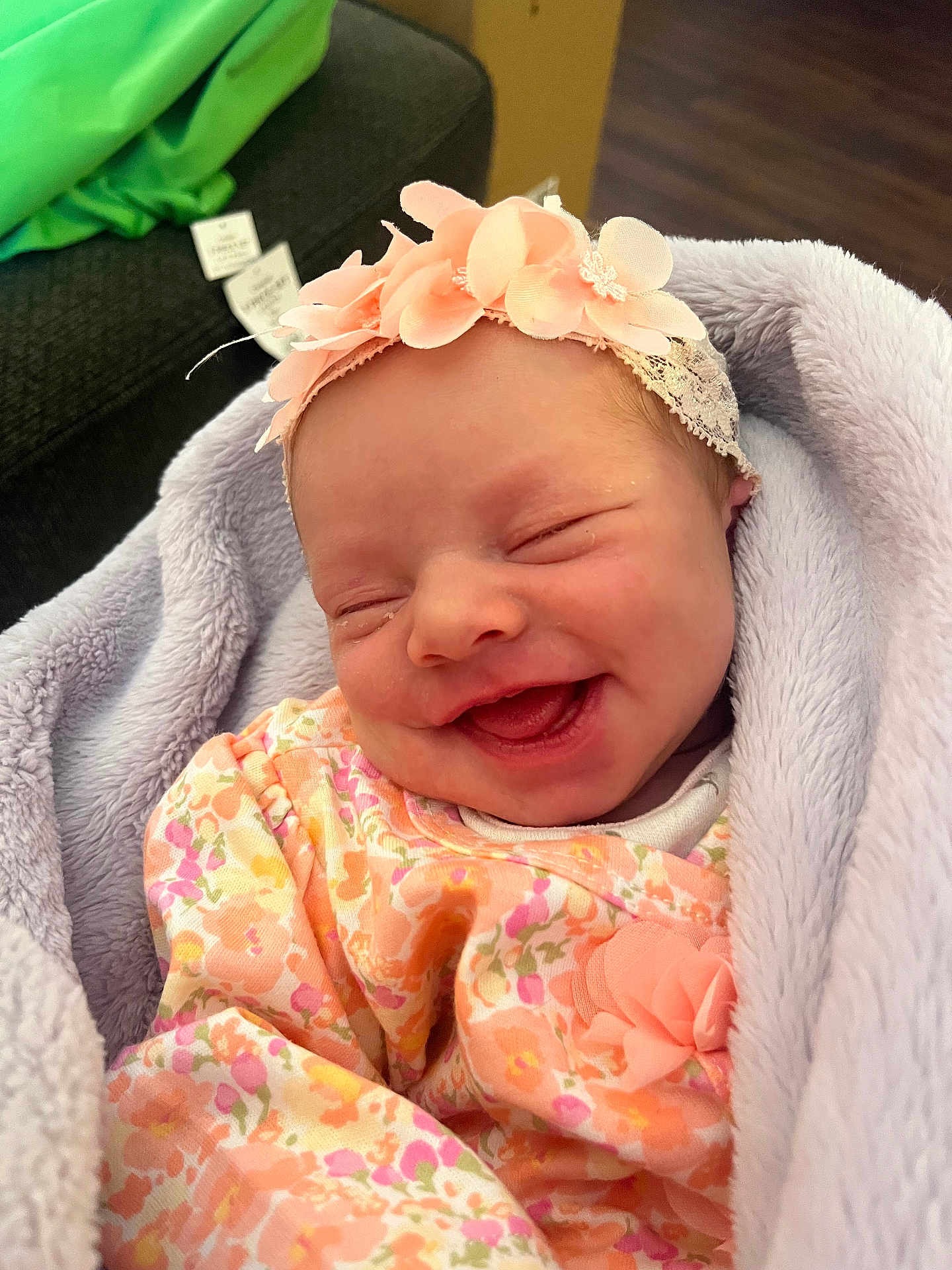 Heavenley joined the competition — help win amazing prizes! newborn, baby, smiling, flower_headband, blanket, floral_outfit, cozy, indoor, soft_texture, wrapped, infant, cute, happy, child, portrait, head, face, sleepy, peaceful, clothing