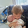 Jj joined the competition — help win amazing prizes! child, baby, hugging, couch, blanket, window, indoor, sibling, tender, love, family, holding, boy, infant, home, portrait, casual_clothing, cozy, blond_hair, curtains