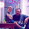 Jj joined the competition — help win amazing prizes! 4th_of_july, casual_clothing, celebration, chair, child, decorative_text, digital_overlay, family, fireworks, glasses, hearts, holiday, indoor, man, people, portrait, shorts, smiling, sneakers, table