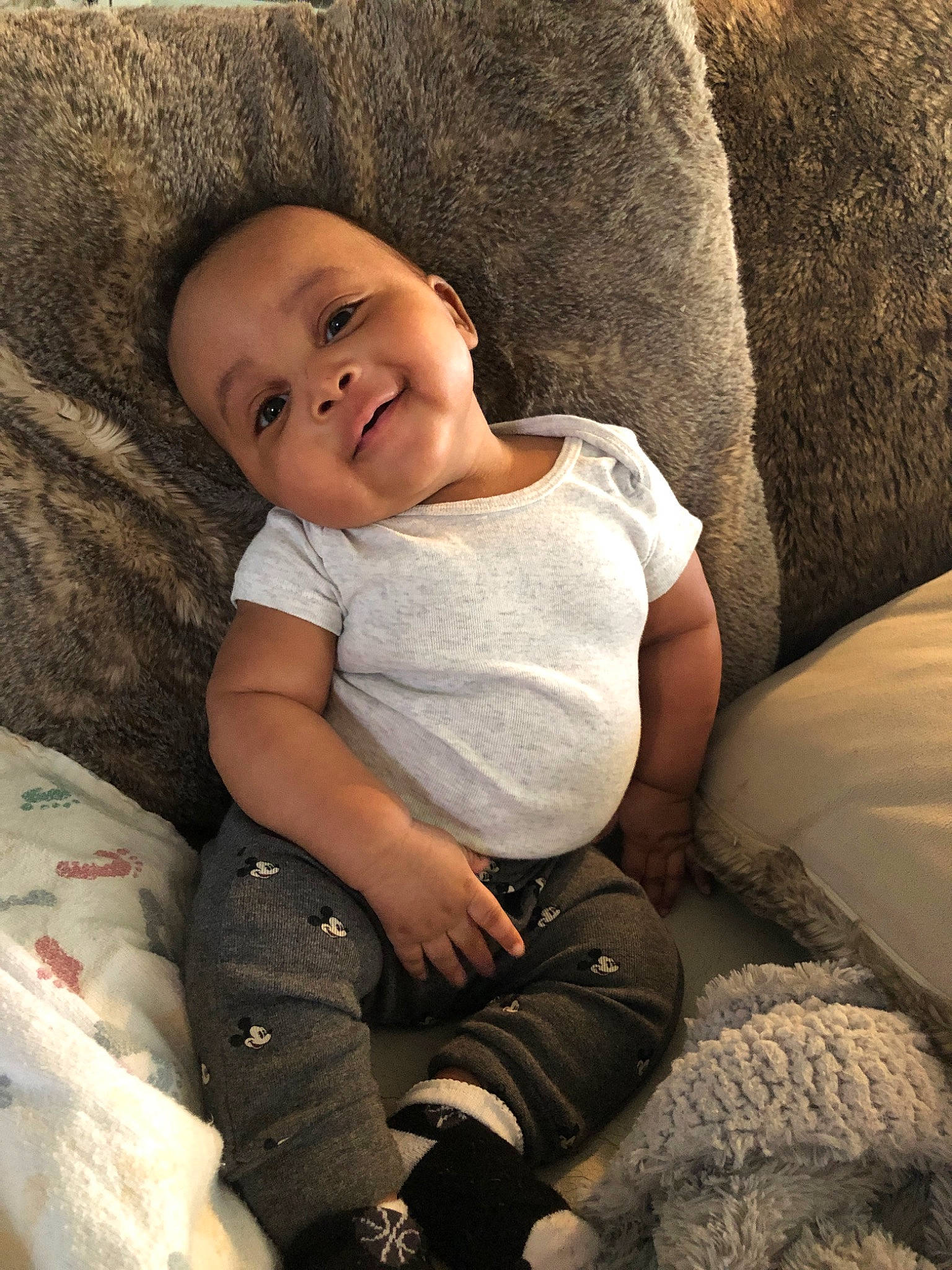 Deangelo is registered to the contest to win money with this photo: baby, cheek, child, comfort, eye, person, sitting, skin, smile, toddler