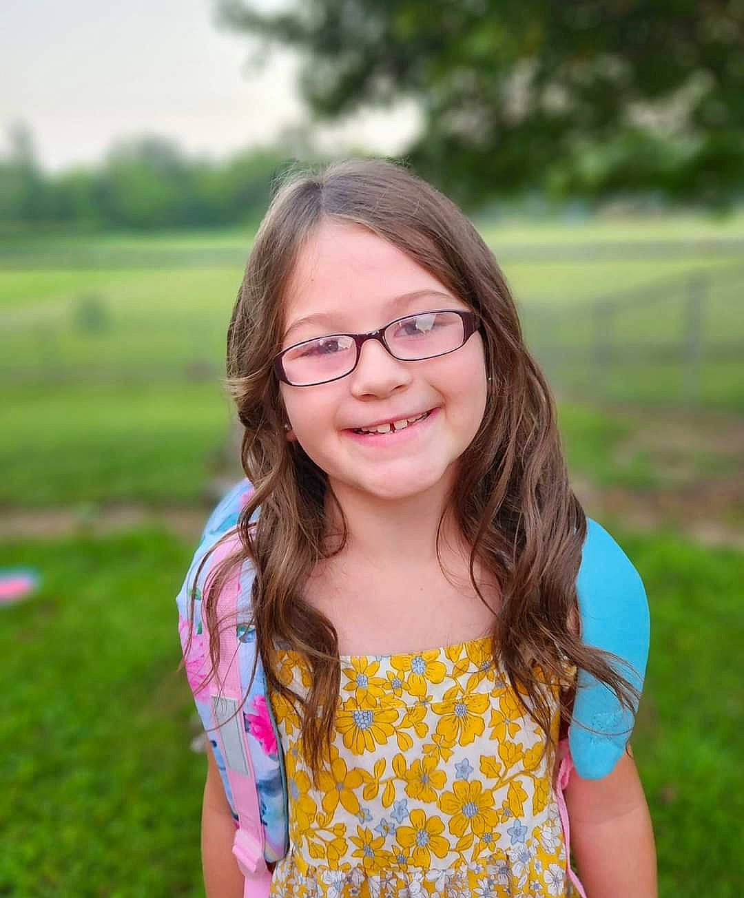 Nova joined the competition — help win amazing prizes! child, dress, eyewear, facial_expression, flash_photography, glasses, grass, grassland, hair, hairstyle, happy, iris, joy, leisure, meadow, people_in_nature, person, plant, skin, smile