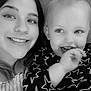 Colsyn is registered to the contest to win money with this photo: black_and_white, casual, child, clothing, couch, eye, face, family, hair, hand, happy, indoor, pattern, person, portrait, skin, smile, star_pattern, toddler, woman