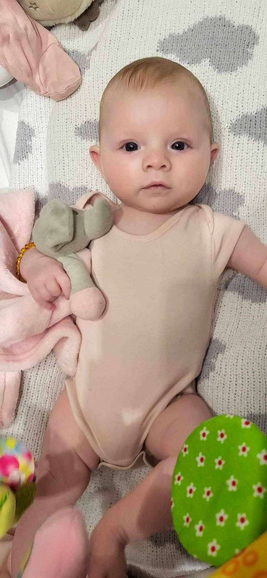 Luna joined the competition — help win amazing prizes! accessories, applique, baby, bed, bedroom, blanket, blonde, bodypart, bracelet, clothing, couch, crib, cushion, diaper, doll, dress, face, finger, furniture, glove