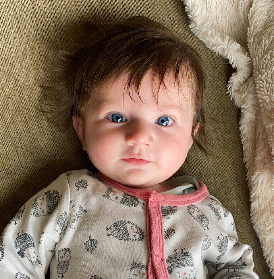 Elora participe au concours pour gagner de l'argent avec cette photo : baby_toddler_clothing, cheek, chin, eye, eyebrow, eyelash, face, facial_expression, hair, head, human, human_body, iris, lip, neck, nose, organ, outerwear, person, skin