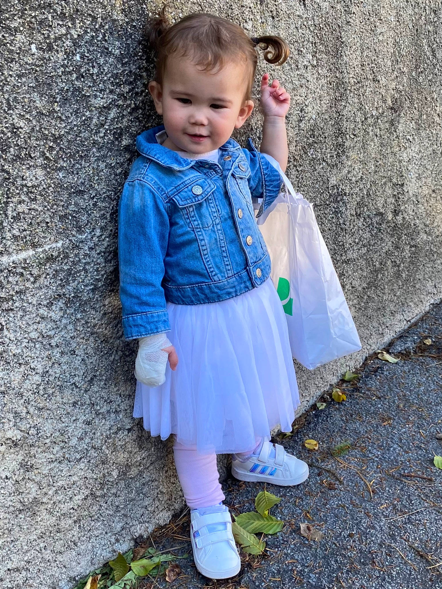 Jasmine participe au concours pour gagner de l'argent avec cette photo : azure, baby, baby_toddler_clothing, child, day_dress, denim, electric_blue, face, fashion_accessory, grass, outerwear, pattern, person, sandal, sleeve, smile, standing, textile, toddler, waist